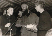 Paul and Flake handing Uwe Hager the collected money for him and the festival.