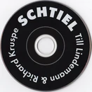 A scan of the front of the CD. Note the engraved inner-ring.